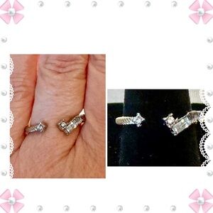 Ring - faux diamonds / clear stones and silver tone stainless steel band - 7.25